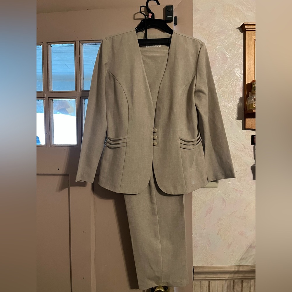 Two piece cream colored pants suit
